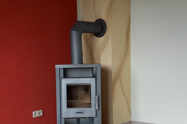 3-Raum-Wohnung Freiberger Straße 511 (WE 302) - Wohnzimmer Kaminofen