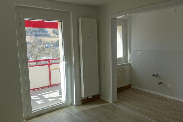 Brettmühlenweg 28 (WE 202) - Wohnzimmer mit Kochnische